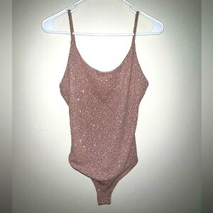 Light pink shimmer leopard bodysuit